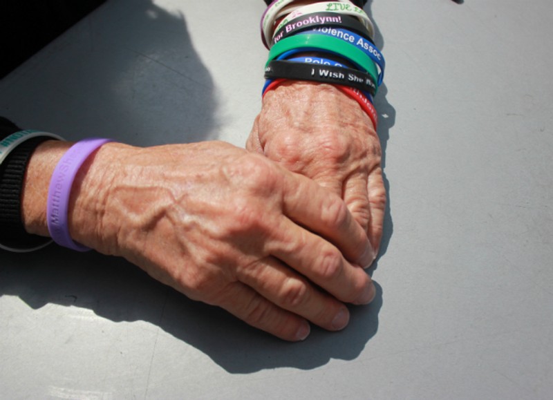 Pat Maisch wears bracelets to remember victims of gun violence. - PHOTO BY DOYLE MURPHY
