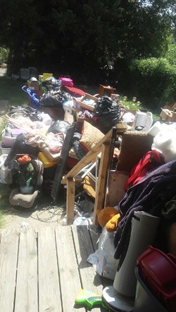 Tunstall's possessions were thrown into her landlord's backyard. - COURTESY OF RHONDA TUNSTALL