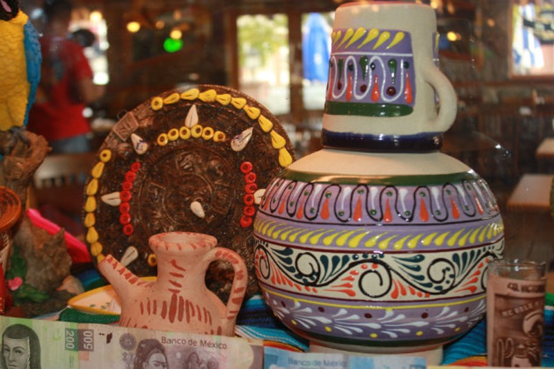 Authentic Mexican artwork decorates the dining room. - Cheryl Baehr