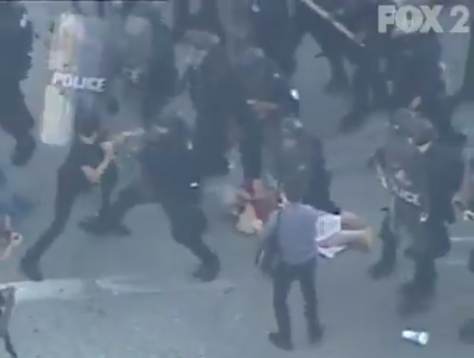 Horrifying Video Shows Cops March Over Old Woman in Downtown St.  Louis