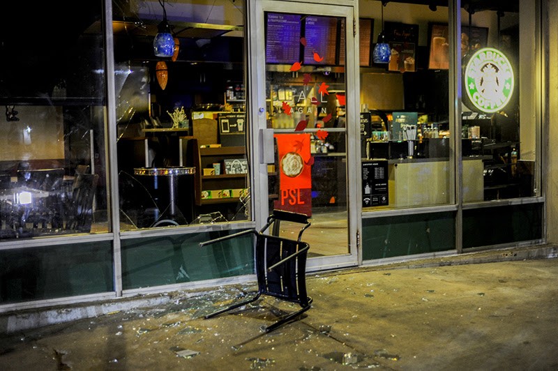 Smashed Windows Line the Loop After Late-Night Protest Turns