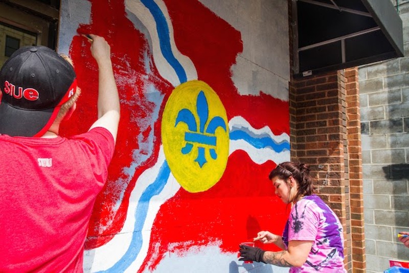 Artists Mark Ostroot and Nicole High paint at Fro Yo. - COURTESY OF PAINTING FOR PEACE IN FERGUSON, A CHILDREN'S BOOK