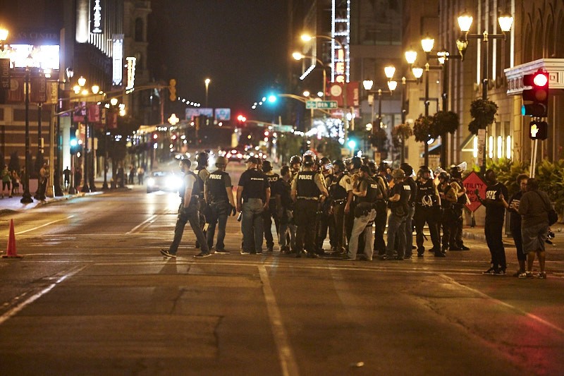 Police mass downtown on Sunday, September 17. - PHOTO BY THEO WELLING