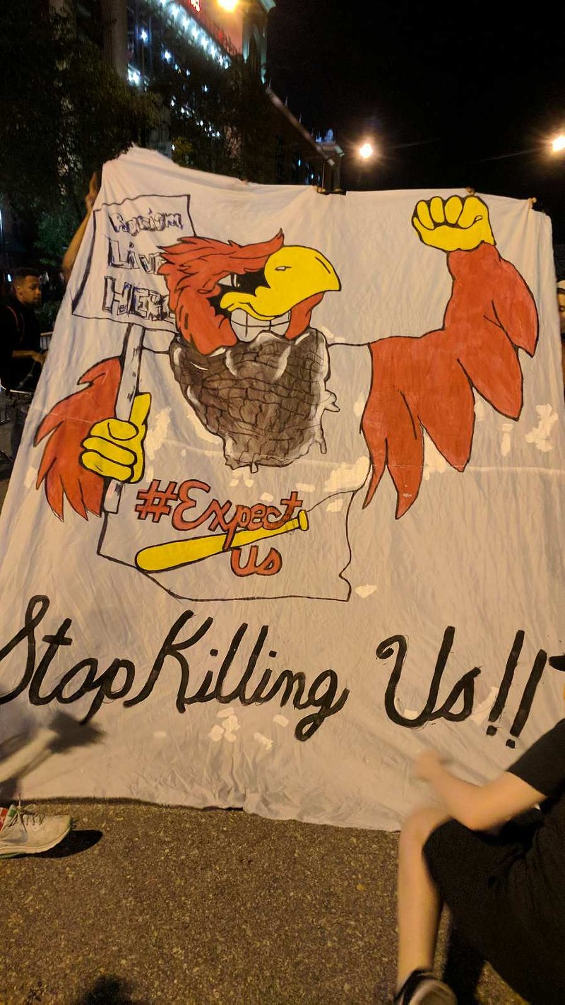 'Stop Killing Us' Banner at Cardinals Game Followed by Pepper Spray and Arrests Outside (2)