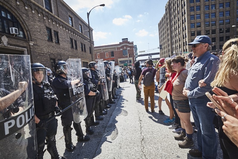 Protesters and police face off in downtown St. Louis on September 15, 2017, the day a former cop was acquitted of murder. - PHOTO BY THEO WELLING