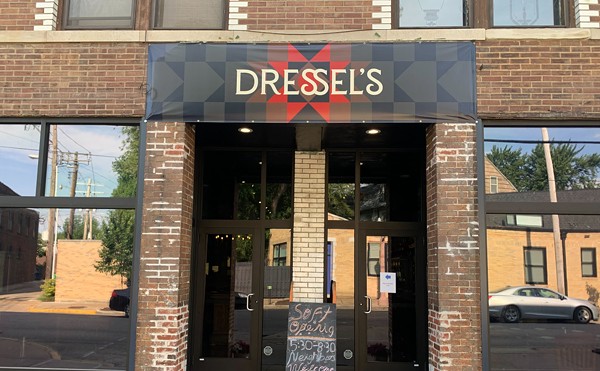 A sign outside Dressel’s entrance on Euclid Avenue invites the pub's Central West End neighbors in for its soft opening.