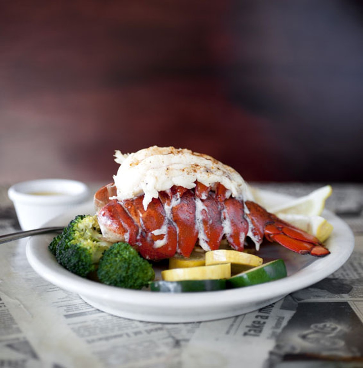 The lobster tail signature entr&eacute;e is simply steamed and served in drawn butter, and can be ordered with a second tail.