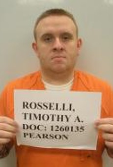 Timothy Rosselli faces federal charges of impersonating an officer.