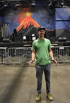 Josh Loyal shows off the huge stage and dancefloor of El Volcan.