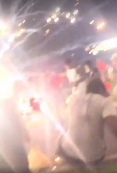 A mortar shell explodes in front of a Webster Groves crowd, captured on video.