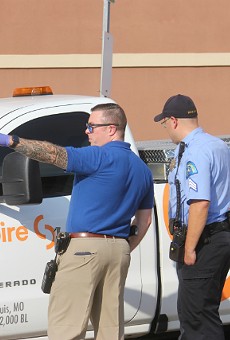 St. Louis police check out a stolen Spire truck.