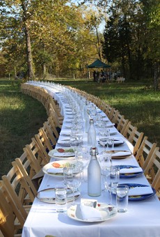 The spread at the 2015 Outstanding in the Field dinner at Such and Such Farm.