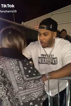 It Was Cold Out Therre, So Nelly Took Off His Jacket for a Fan