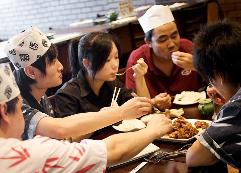 The owners and staf sit down for lunch after the customers have gone. See more photos from Sushi Ai.