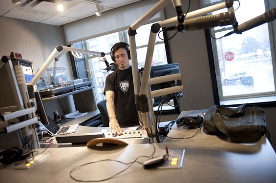 Andy Coco broadcasting The Rhythm Section from the second-floor studios of KDHX&rsquo;s newly opened Larry J. Weir Center for Independent Media.