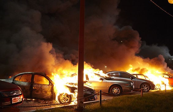 Cars at a dealership were set on fire.