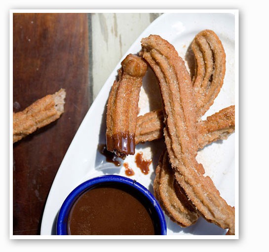 &nbsp;&nbsp;&nbsp;&nbsp;&nbsp;&nbsp;&nbsp;Cinnamon-coated churros with chocolate sauce at Mission Taco. | Jennifer Silverberg