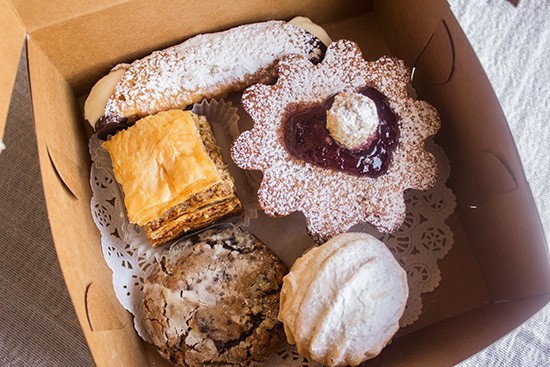 Assorted pastries from the shop: baklava, cannoli, frangipane and cookies.