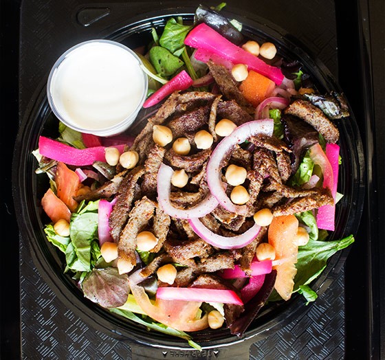 Beef-shawarma salad with romaine, spring mix, tomato, onion, pickle, cucumber, pickled turnips, chickpeas and tahini dressing. | Photos by Mabel Suen