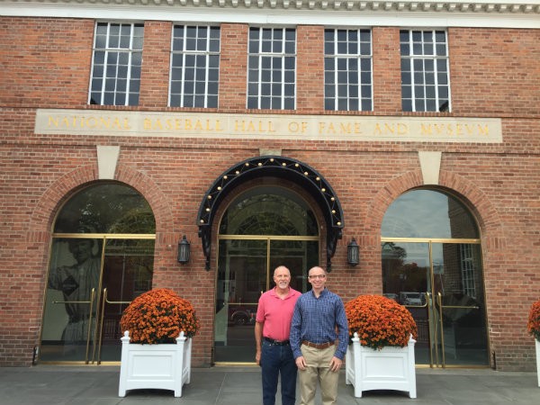 Bill Clevlen (right) with his dad, Rick, in front of the National Baseball Hall of Fame in Cooperstown, New York. - PHOTO COURTESY OF BILL CLEVLEN