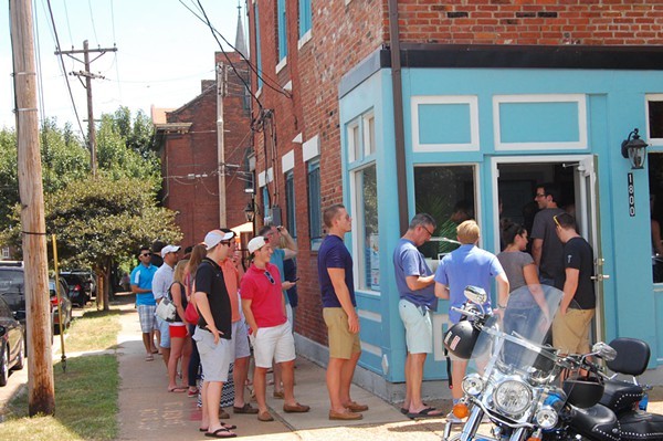 A line outside Tropical Liqueurs on its opening weekend. - PHOTO BY KRISTIE MCCLANAHAN