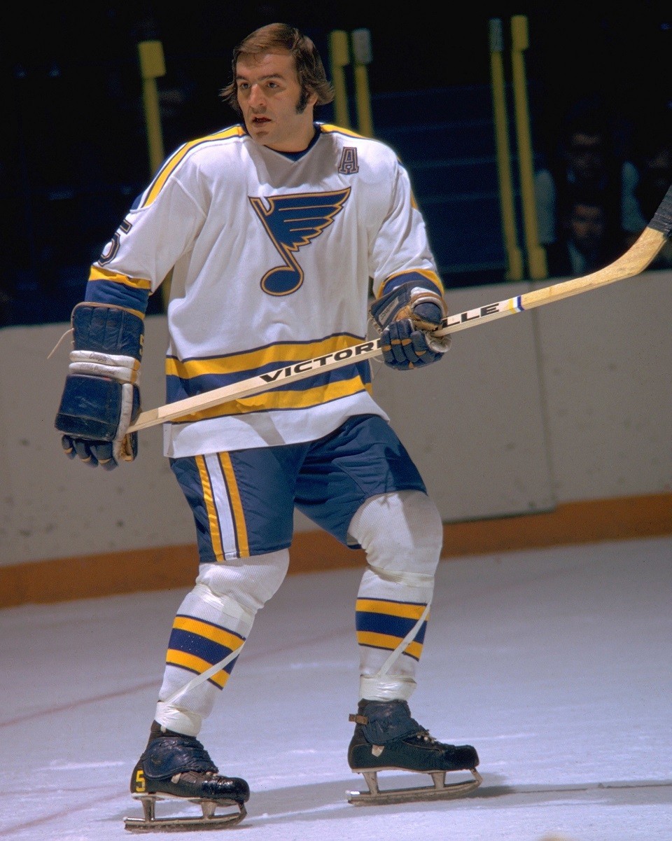 The Blues' Bobby Plager helps break in the ice at the team's new