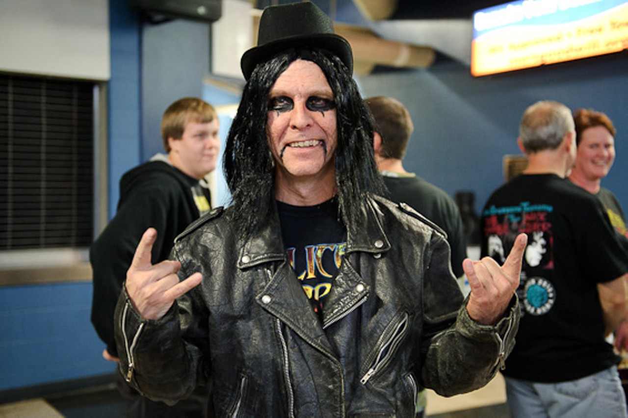 A fan shows off his best Alice Cooper look.