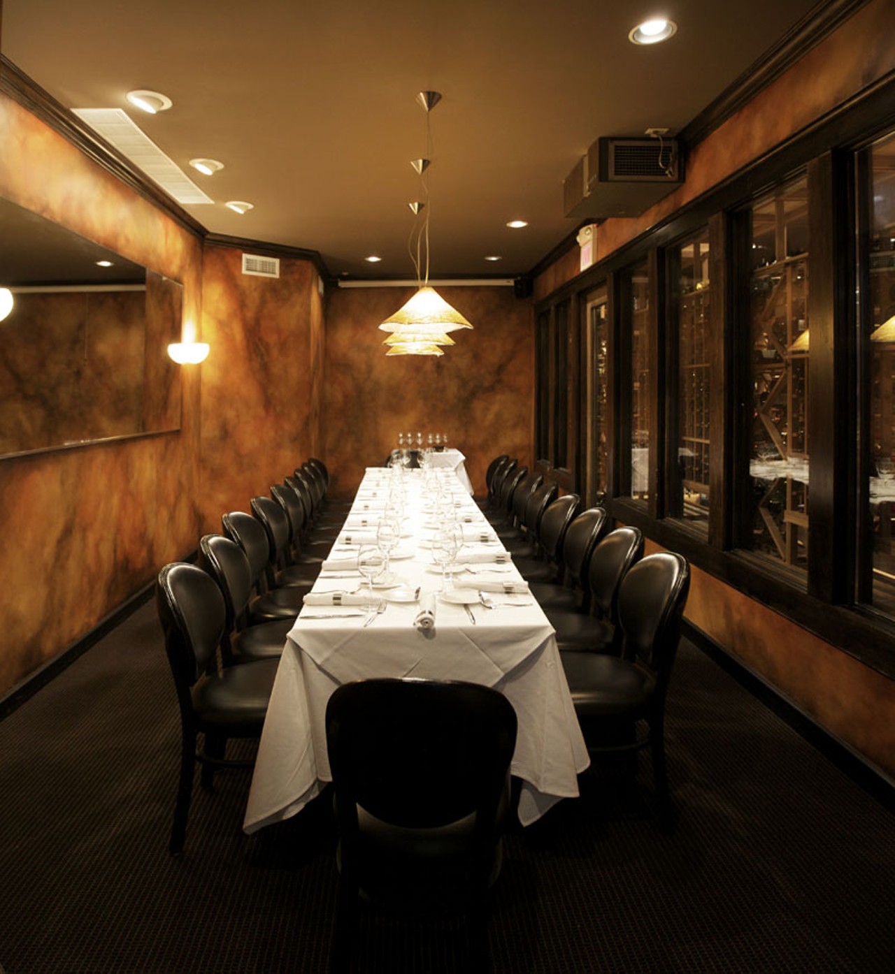 The wine room, a private dining room adjacent to the main dining room, seats 20 guests.