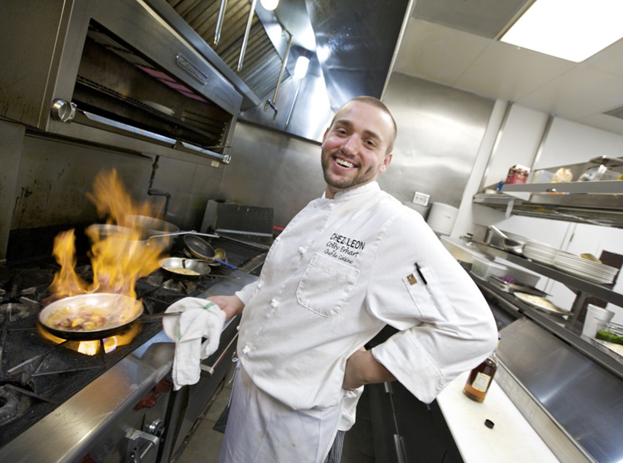 Chef de Cuisine, Colby Erhart, doing his thing in the kitchen at Chez Leon.