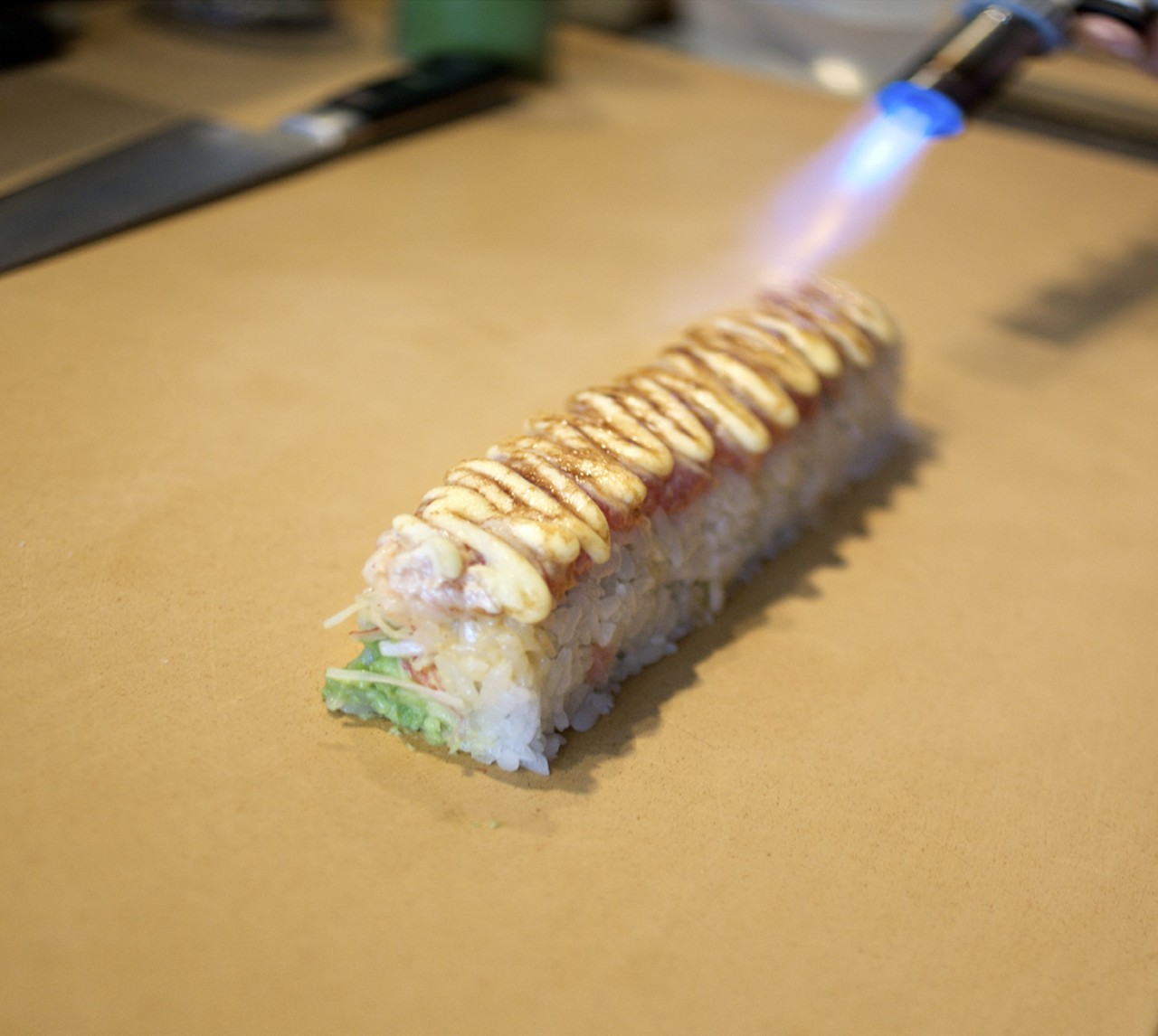 Sushi preparation, never a disappointment. I heart kitchen torches!