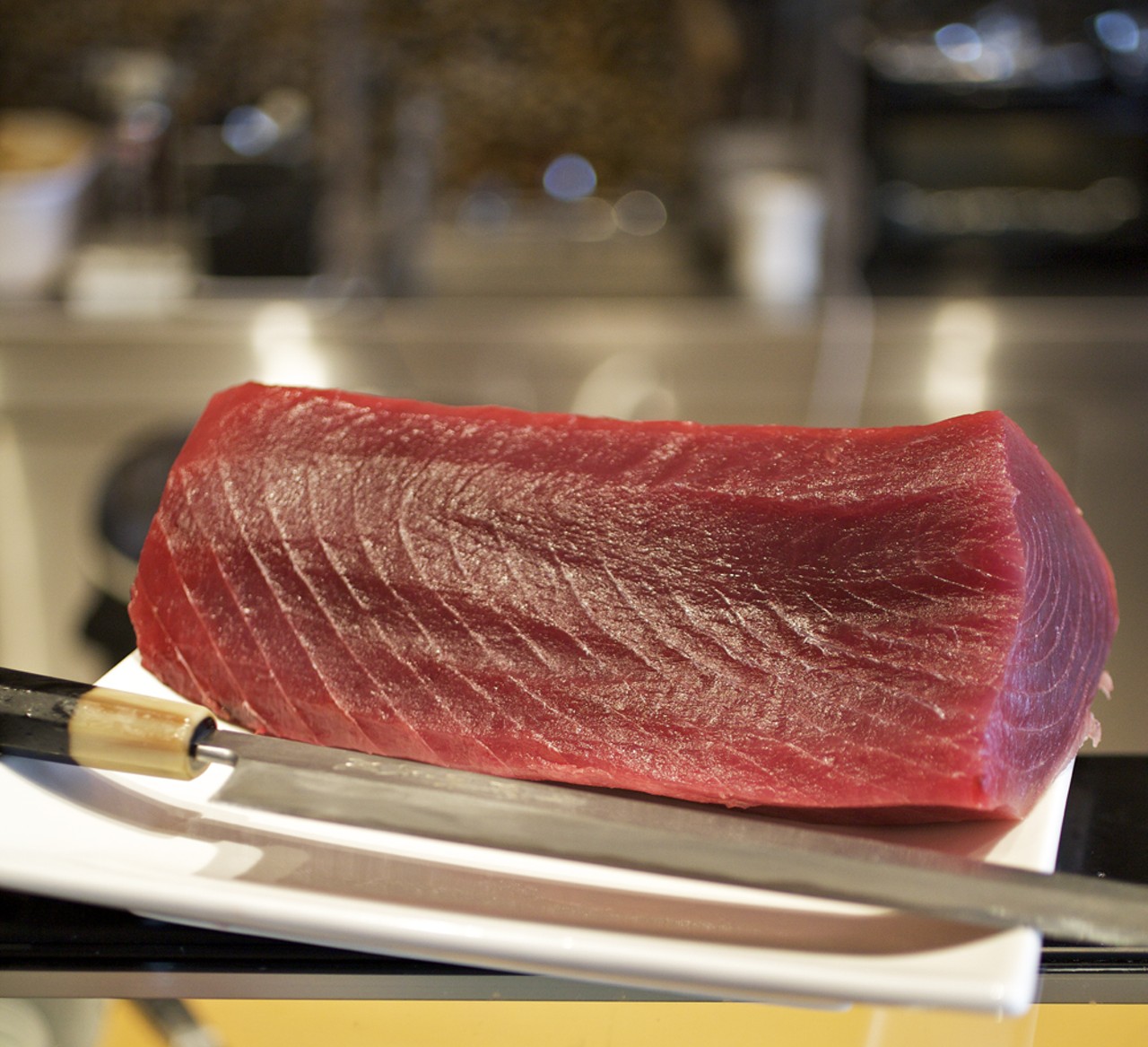 A cut of tuna in the kitchen.