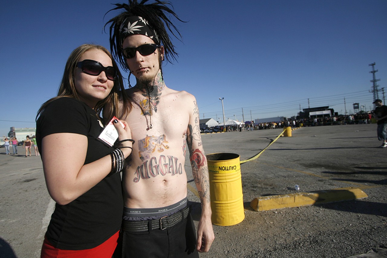 Nicole and Race pose for a photo before they get in line for the show. "I don't really bother myself too much with what people say," said Race when asked for his view about the perception of Juggalos.