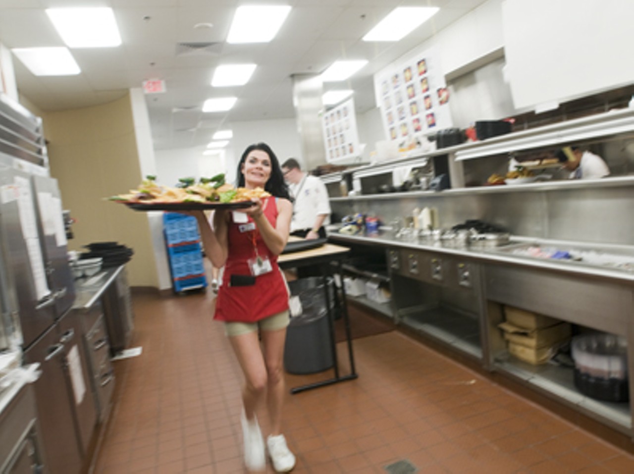 A Sammy's server heads to the dining room.
