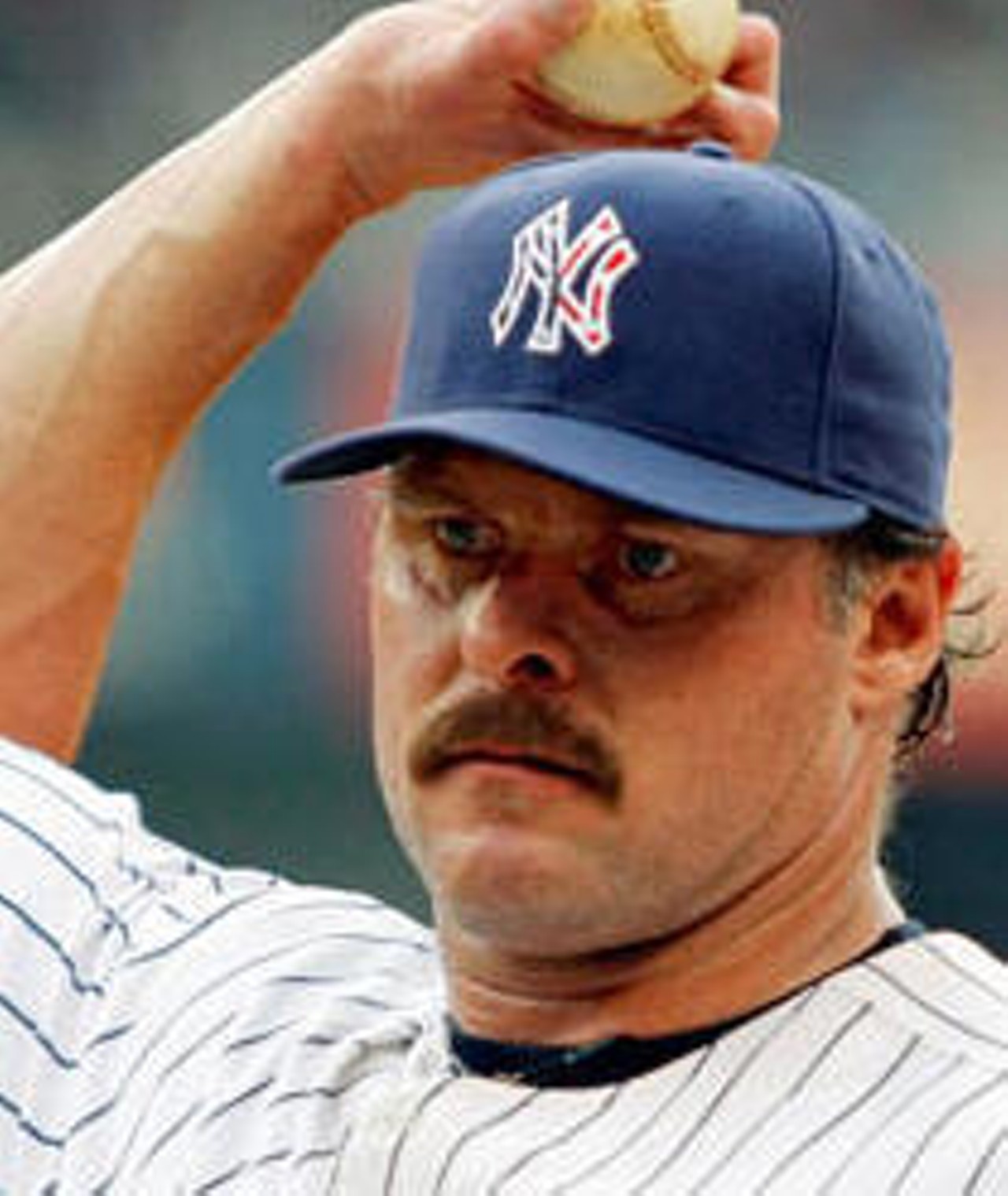 8. Jason Giambi
I know what you're thinking. You're thinking to yourself, "That's one of the worst mustaches I've ever seen!" 
You're absolutely right. And therein, my short-sighted friends, lays the beauty of this 'stache. 
You know why this is a great mustache? Because Jason Giambi did that to himself on purpose. Give that a second to sink in. See, something like that doesn't just happen by accident. You have to try, and try hard, to produce a mustache that shitty. So no, it isn't some sort of awful mistake that Jason ended up looking like an extra from the Beastie Boys' "Sabotage" video. He meant that shit. If you can't handle it, that's your problem, pal.