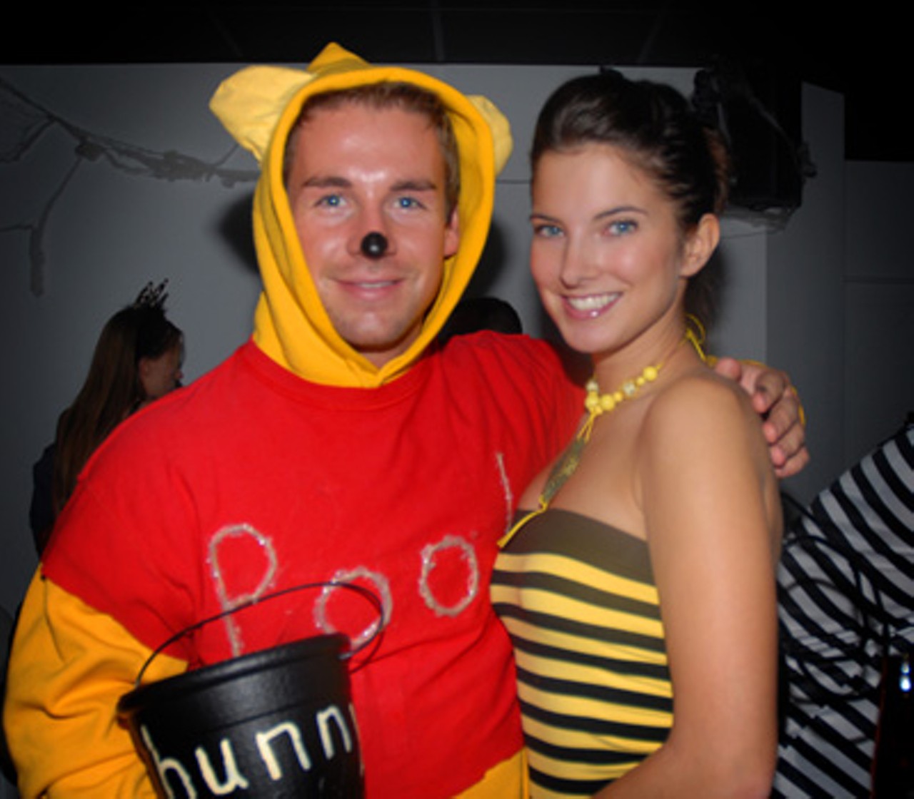 Pooh (Caleb Watters) and the Honey Bee (Erica Schlemmel) have the same interests at Sugar Lounge.