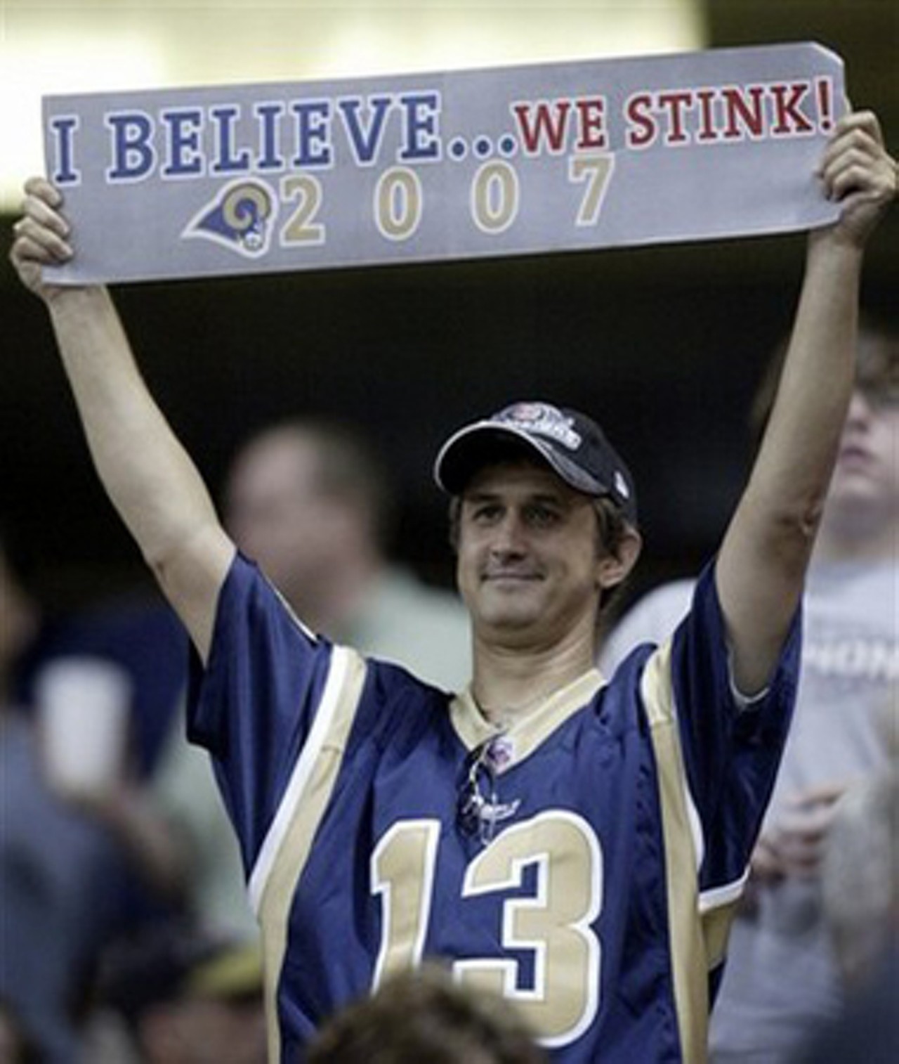 We Stink!
Any St. Louis Rams apparel. If you've already bought something, the receiver of your gift may also ask for a paper bag to wear over their head.