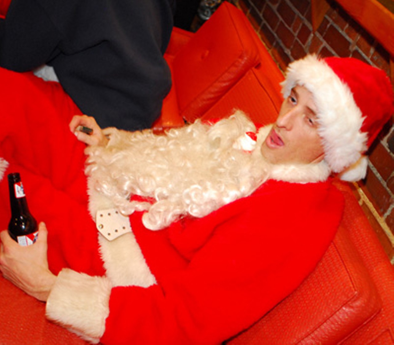 Gabriel "Clause" slides low in his seat, but still holds on to his beer.