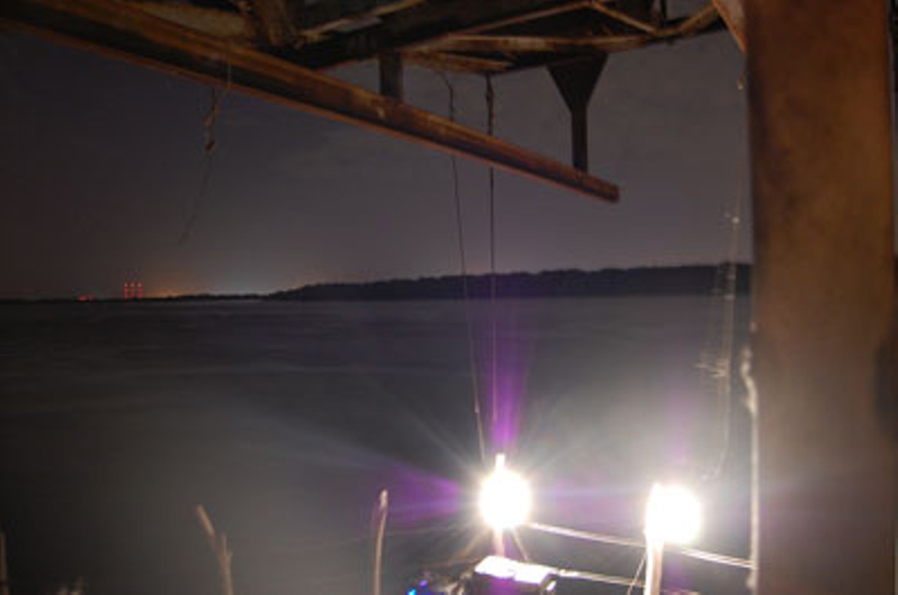 A view of the Mississippi River. The lights were powered by gasoline generators that hummed along in the background.
