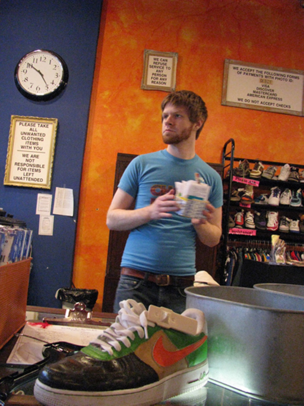 Rag-O-Rama employee Nate Bethel and one of the store's best assets, sick Nike sneaks, Bethel reported.