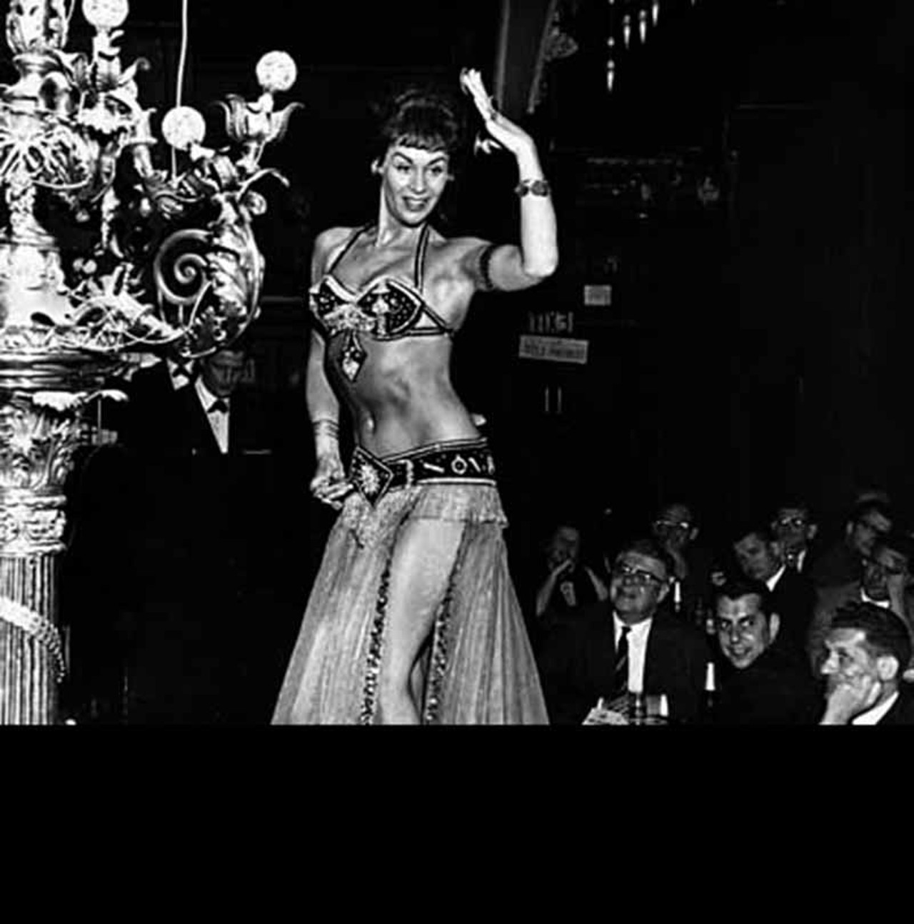 A belly dancer at the Crystal Palace, a cabaret theater.