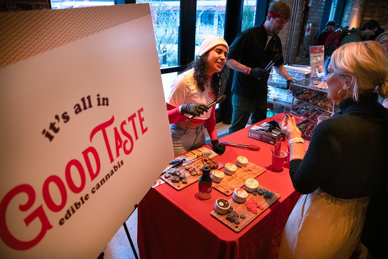 Damarys Agudelo, left, speaks with Tommi Leasck about Good Taste’s selection of edible cannabis products.