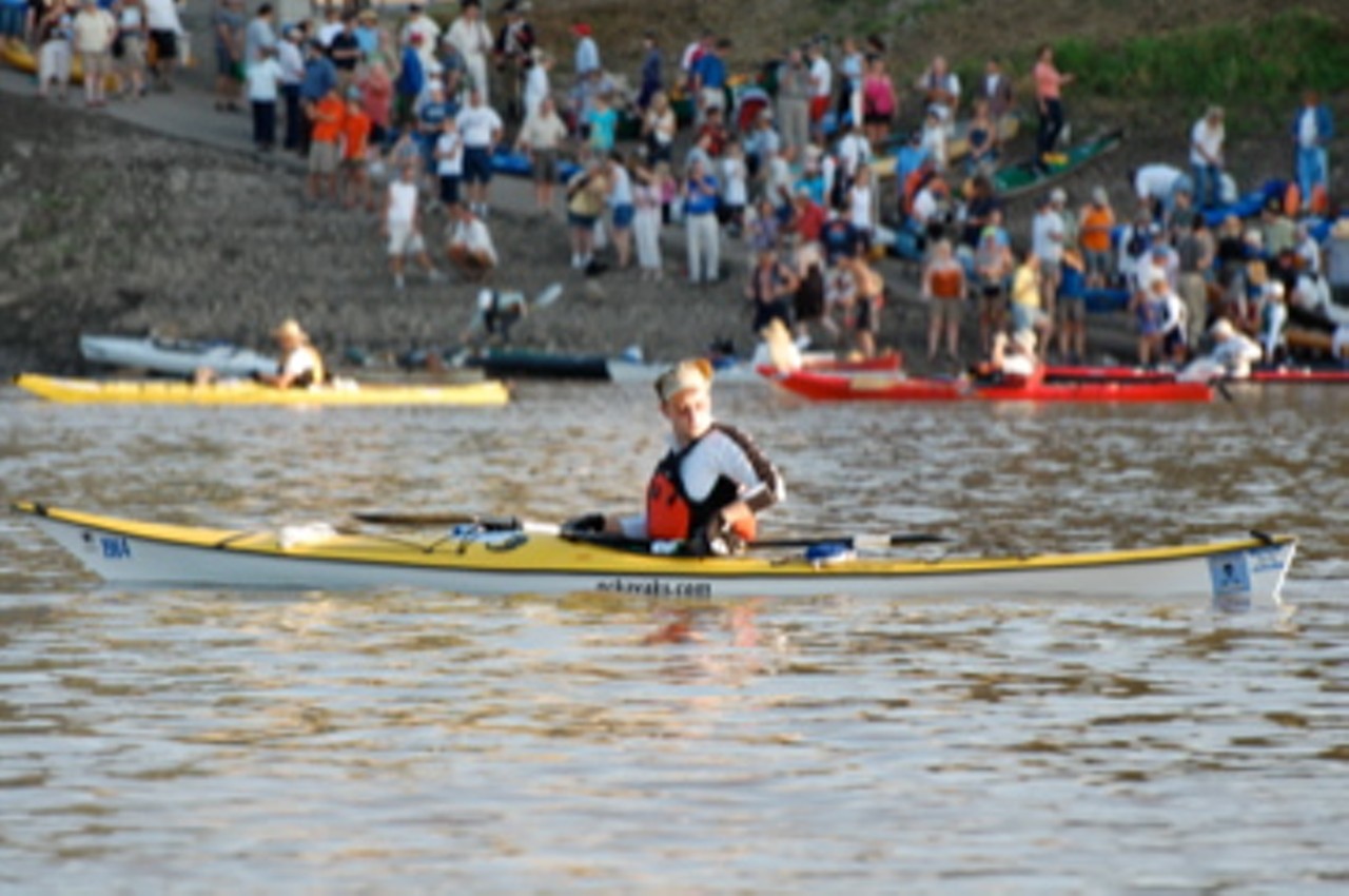 With a large crowd at Kaw Point in Kansas City, Kansas, racers get prepared for a marathon trip.