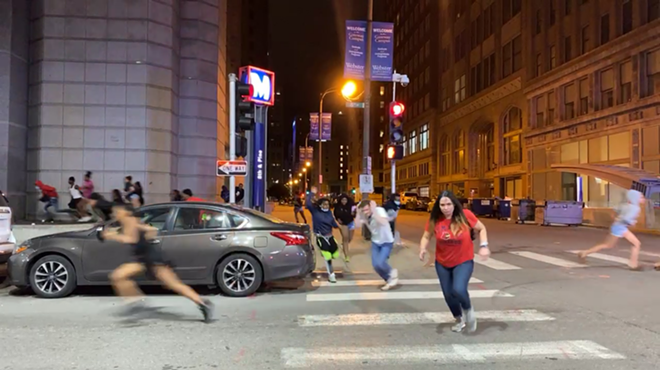 Footage captured by Derk Brown shows bystanders running from gunfire.