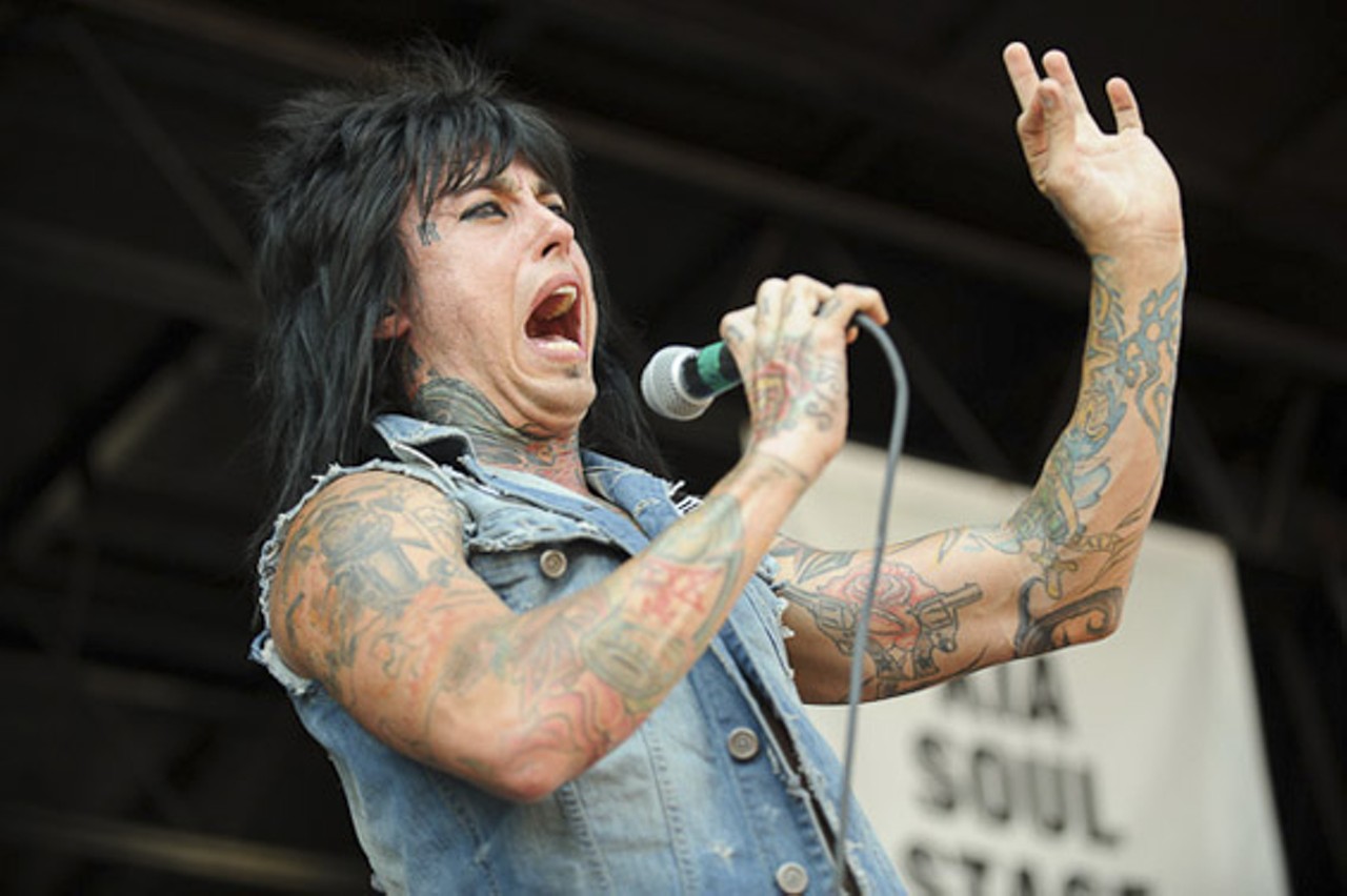 Falling in Reverse performing at Warped Tour at the Verizon Wireless Amphitheater in St. Louis on July 5, 2012.