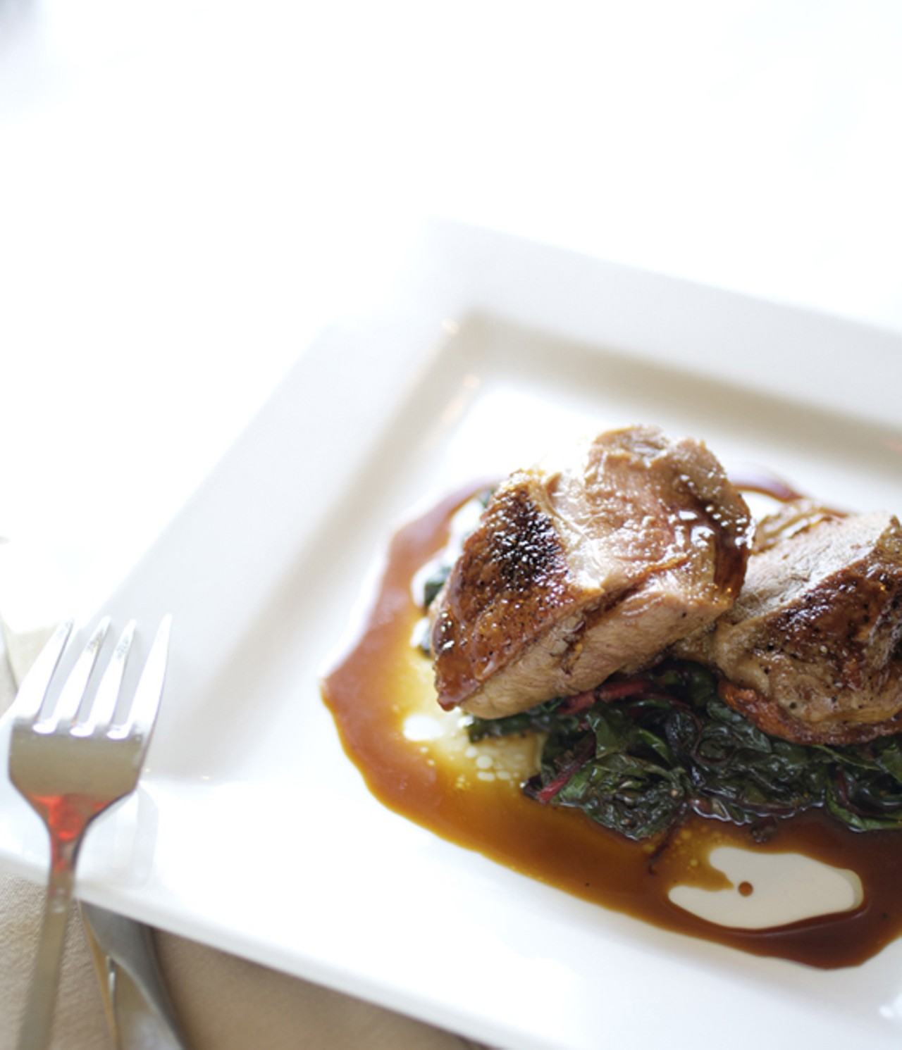 Sorghum laquered duck with swiss chard. The swiss chard is sourced locally.