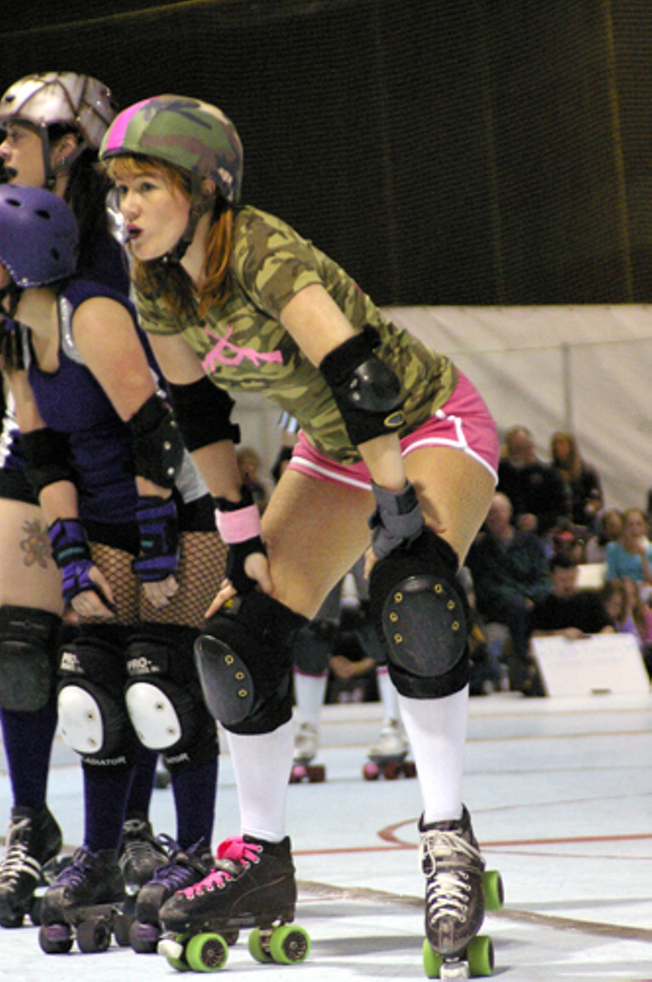 In flat-track roller derby, there are three main positions. &ldquo;Pivots&rdquo; can be recognized by the stripe on their helmets. They control the speed of their team members and serve as the last line of defense against an opposing scorer.